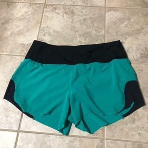 green lululemon shorts